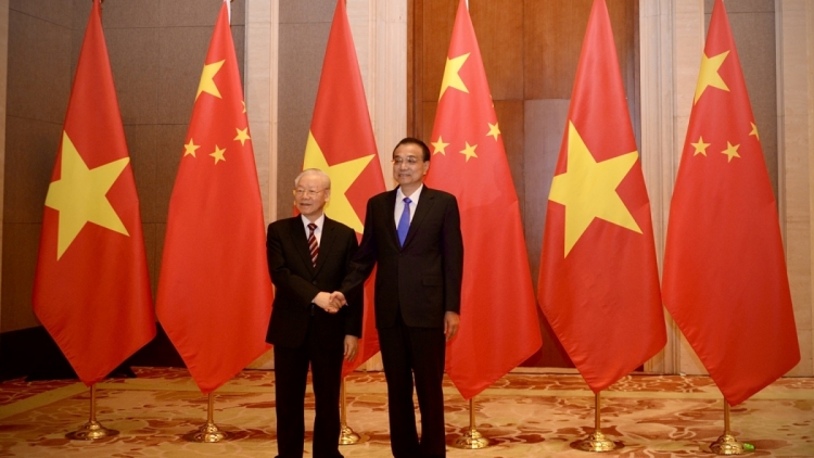 Tổng Bí thư Nguyễn Phú Trọng lưm prá lâng Thủ tướng Quốc vụ viện Trung Quốc Lý Khắc Cường