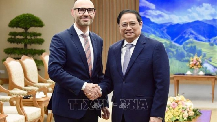 Thủ tướng Tĕh đak Phạm Minh Chính sơng pơma dơnŭh hăm Tổng Thư ký Kơdranh xek tơlang apŭng plĕnh tĕh