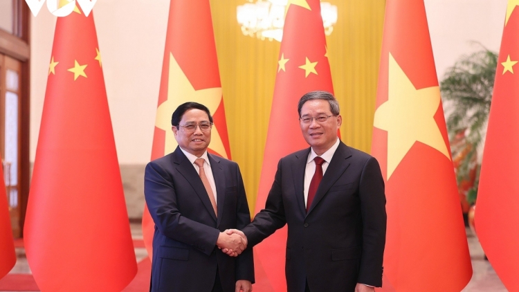 Thủ tướng Lý Cường k’đhơợng bhrợ bhiệc hơnh deh Thủ tướng Phạm Minh Chính tước lum k’tiếc k’ruung Trung Quốc