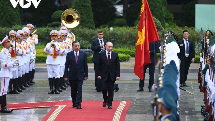 Củ tịc lơgar ồng Tô Lâm đơng lam dơ̆ wă rò kấp dà lơgar Kwang atbồ lơgar Nga ồng Vladimir Putin