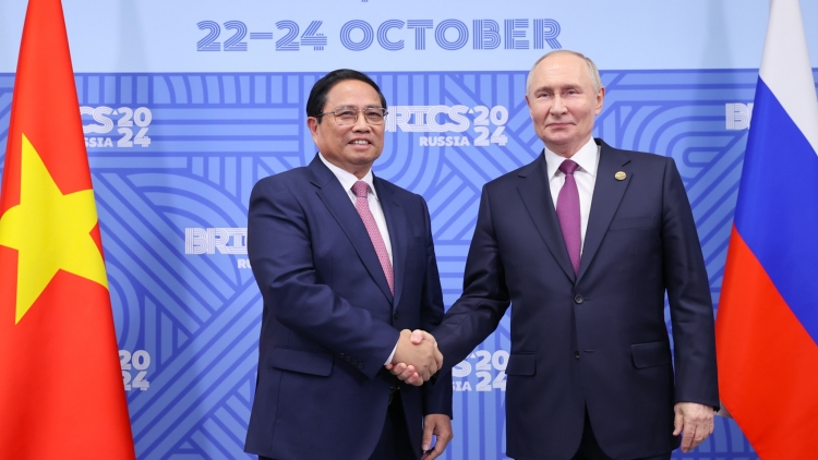 Thủ tướng Cíñ phủ Phạm Minh Chính cribơyai mờ Kwang atbồ lơgar Nga ồng Vladimir Putin 