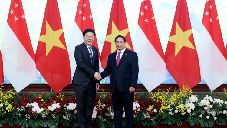 Khua knŭk kna Phạm Minh Chính bi trông hŏng Khua knŭk kna Singapore Lawrence Wong 