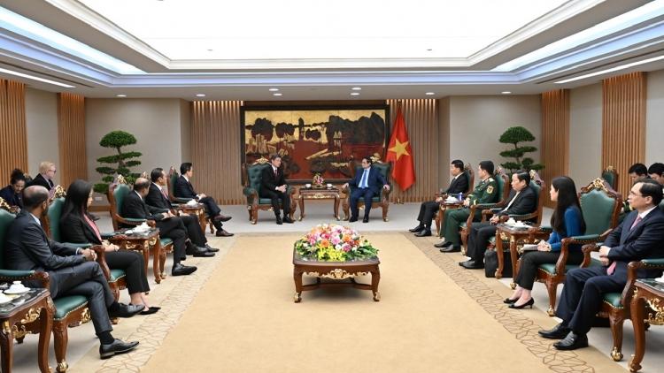 Khua knŭk kna Phạm Minh Chính drông k’iăng khua gĭt gai Đảng ngă bruă yang ƀuôn Singapore 