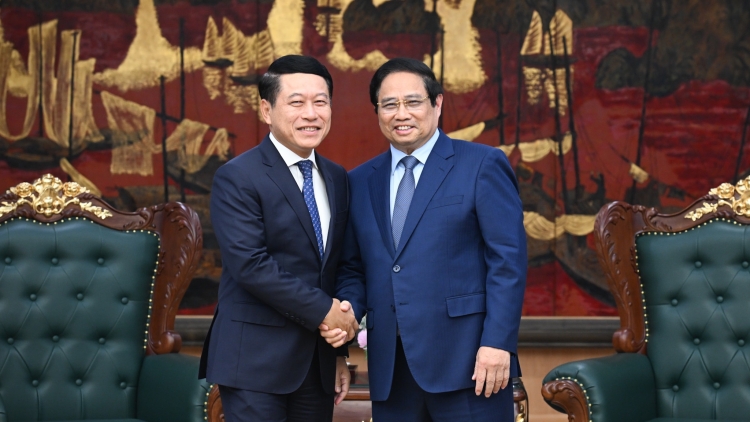 Thủ tướng Chính phủ Phạm Minh Chính vơt rmôt kan ntoh măt Rnâng kan rgâl mhe nau kan tăch rgâl bah Lào