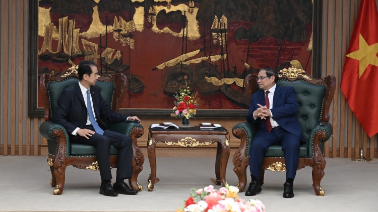 Thủ tướng ồng Phạm Minh Chính wă Kwang atbồ Anih lơh broă ala măt lơgar Lo tàm lơgar Việt Nam ồng Hà Vĩ