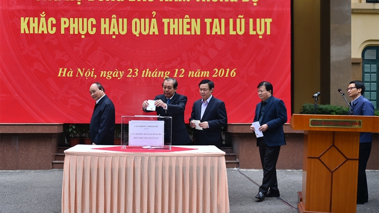 Thủ tướng Nguyễn Xuân Phúc tơle\ch nơ\r krao bhơvơn tơgop tơgu\m ăn kon pơle\i răm ‘mi kial pơram tơring To\k bok