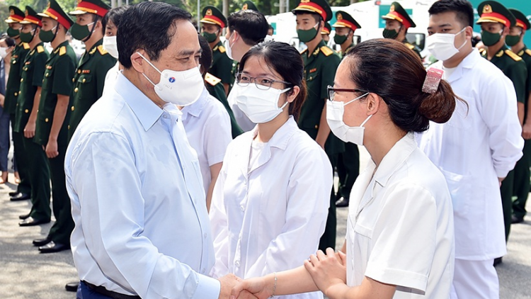 Thủ tướng Phạm Minh Chính pơtruh kơthơ hơlêm rim khŭl bơ̆ jang tang găn jĭ hơbŭh Covid-19