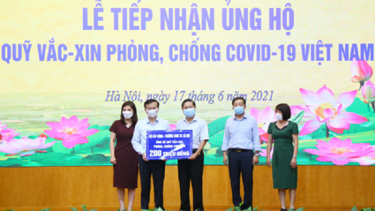 Mentri Lao động - Thương binh & Xã hội rik tame Kadung jien vaccine pacang caga Covid-19