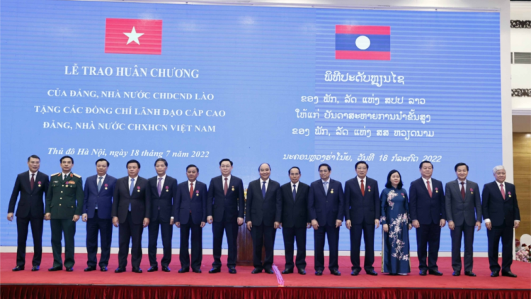 Bấc bh’rợ hơnh deh bhiệc bhan hơnh deh 60 c’moo t’ngay bhrợ t’vaih pr’ặt ngoại giao, 45 c’moo t’ngay ký Hiệp ước zr’ziêng lâng pa zưm  bhrợ bhlưa Việt Nam-Lào