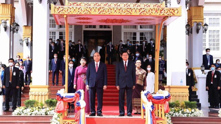 Dơ̆ wă rò yŭ rơyùm Chủ tịch lơgar ồng Nguyễn Xuân Phúc còp git gơp lơh bơyô rềp mềr ngan ngồn lơgar Lào