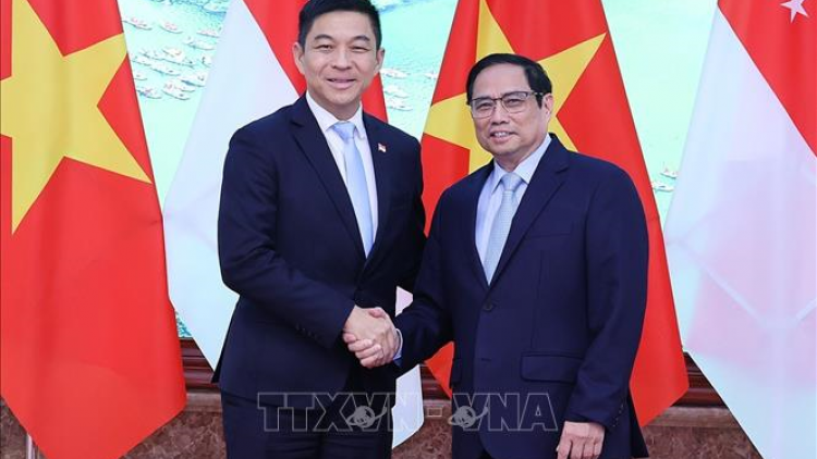 Thủ tướng ồng Phạm Minh Chính wă Củ tịc Quôk hội lơgar Singapore