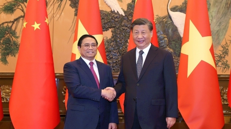 Thủ tướng Phạm Minh Chính pơtôch ‘lơ̆ng liĕm ‘măng năm tơmang teh đak Cộng hòa nhân dân Trung Hoa păng vang Hop akŏm WEF 2023