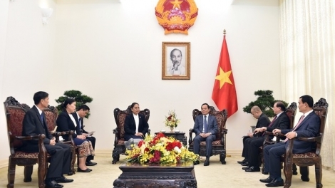 Phó Thủ tướng Trần Lưu Quang wă Ƀộ trưởng Ƀộ Thông tin lơgar Lào