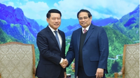 Khua knŭk kna Phạm Minh Chính drông leh k’iăng khua knŭk kna Lào