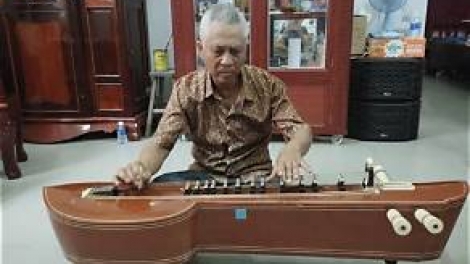 លំនាំល្អឯកនៃឧបករណ៍ភ្លេងតាឃេ