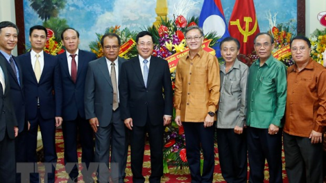 Phó Thủ tướng Phạm Bình Minh hơnh Tết ty Bunpimay âng Lào