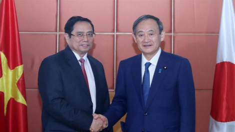 Kuang atbồ mpồl bơyai broă Dà lơgar ồng Phạm Minh Chính cri bơyai mờ Thủ tướng lơgar Nhờk ồng Suga Yoshihide