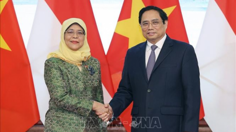 Pôa Phạm Minh Chính, Ngế pro xiâm hnê ngăn Chin phuh tơdah Kăn xiâm pơkuâ kong têa Singapore