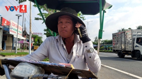 លោកឡេវ៉ាំងមិញ ជាយុទ្ធជនពិការតែមិនអសារបង់។