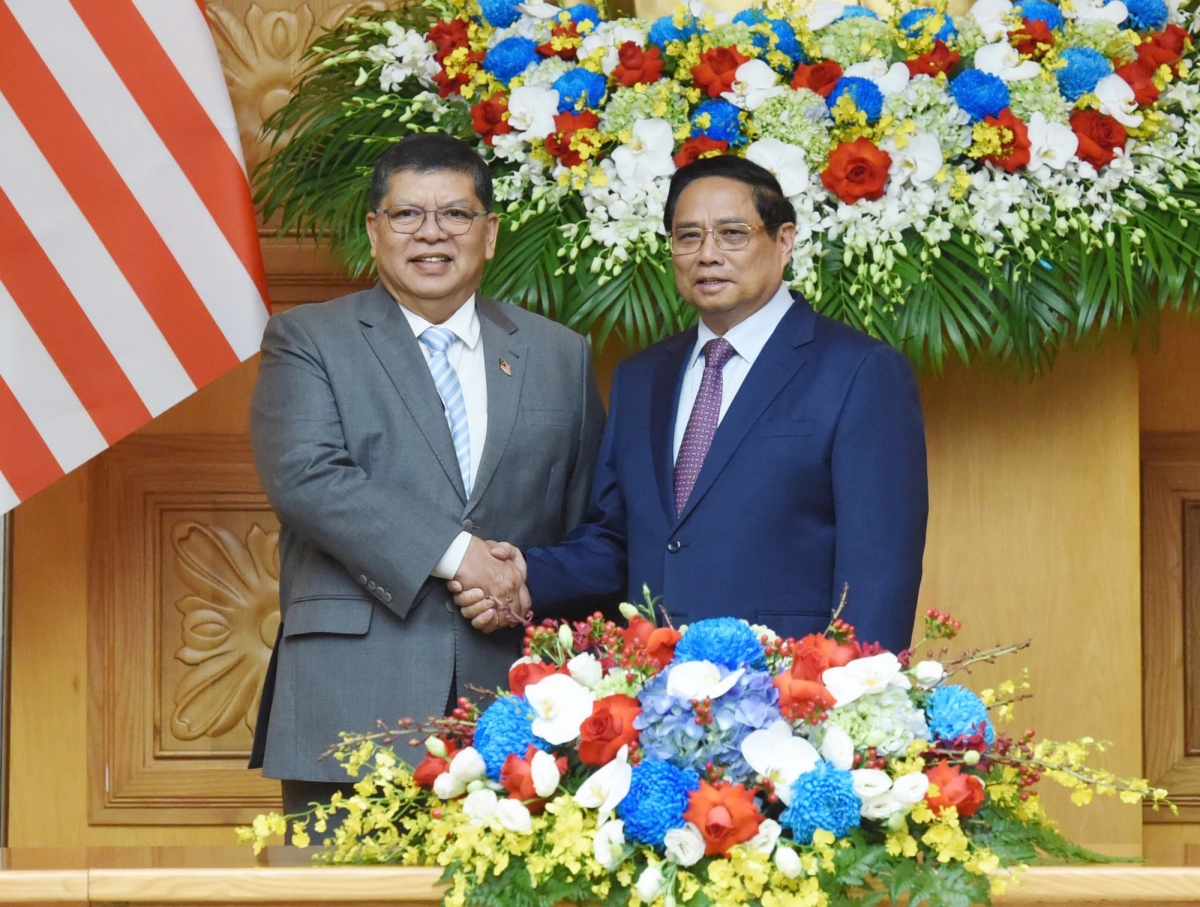 Khua dêh čar ta ơi Phạm Minh Chính bơkơtuai hăng Khua git gai pơ ala mơnuih ƀôn sang gơnong yŭ dêh čar Malaysia