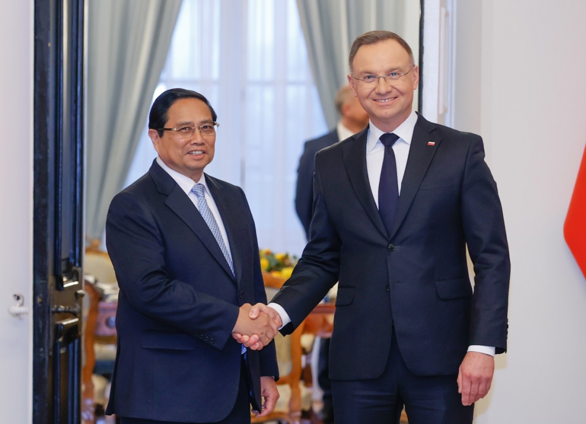 
Thủ tướng Phạm Minh Chính tơƀâp, pơma nuh hăm Kơdră tơm teh đak Ba Lan