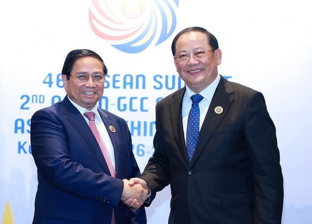 
Thủ tướng Teh đak Phạm Minh Chính hăm Thủ tướng Lào Xỏn-xay Xi-phăn-đon